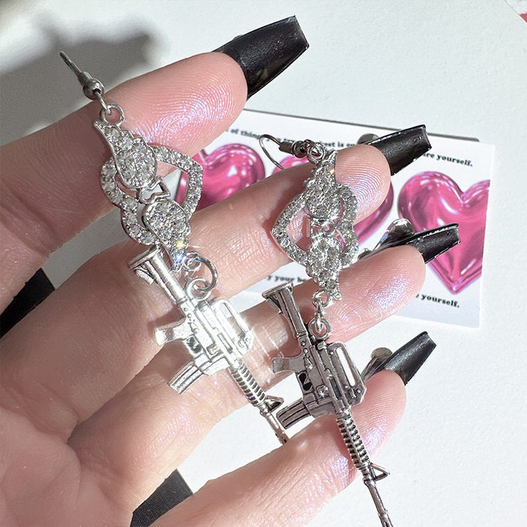 VILZSTUDIOS Unique earrings featuring a gun shape design
