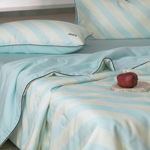 VILZSTUDIOS mint-blue and cream diagonal stripe summer quilt with brown cartoon bears and dark contrast piping