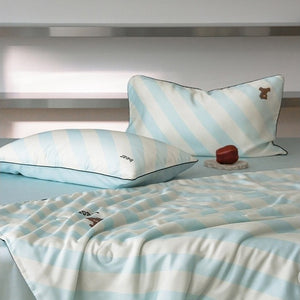 VILZSTUDIOS mint-blue and cream diagonal stripe summer quilt with brown cartoon bears and dark contrast piping