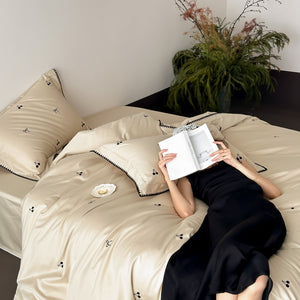 VILZSTUDIOS pastel satin duvet cover set with black cherry and bow embroidery and black zigzag borders