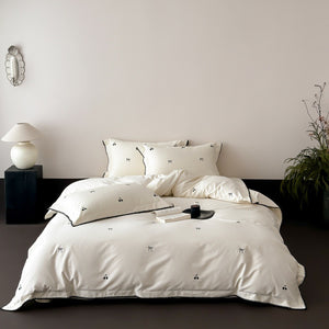 VILZSTUDIOS pastel satin duvet cover set with black cherry and bow embroidery and black zigzag borders