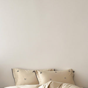 VILZSTUDIOS pastel satin duvet cover set with black cherry and bow embroidery and black zigzag borders