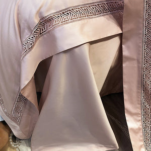 VILZSTUDIOS blush pink satin bedding set with geometric cut-out lace borders