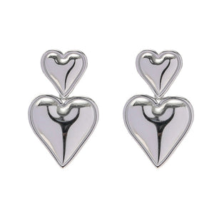 VILZSTUDIOS Heart shaped statement earrings made of zinc alloy