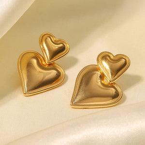 VILZSTUDIOS Heart shaped statement earrings made of zinc alloy