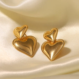 VILZSTUDIOS Heart shaped statement earrings made of zinc alloy