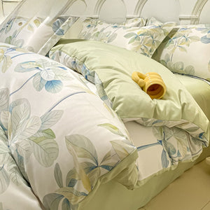 VILZSTUDIOS soft green and blue botanical print satin bedding set with coordinating solid-color reverse