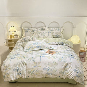 VILZSTUDIOS soft green and blue botanical print satin bedding set with coordinating solid-color reverse