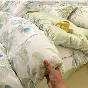 VILZSTUDIOS soft green and blue botanical print satin bedding set with coordinating solid-color reverse