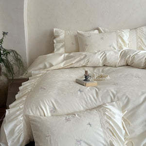 VILZSTUDIOS blush pink butterfly and floral embroidered bedding set with lace borders and gathered ruffles