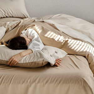 VILZSTUDIOS neutral and pastel two-tone duvet cover set with round button details on pillowcases