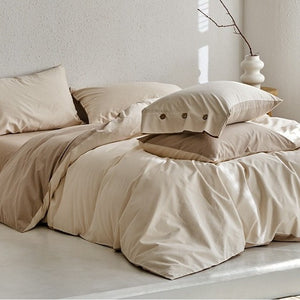 VILZSTUDIOS neutral and pastel two-tone duvet cover set with round button details on pillowcases