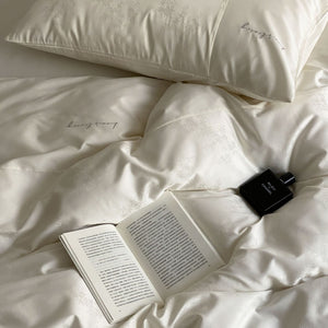 VILZSTUDIOS champagne beige floral jacquard duvet cover set with solid borders and script embroidery