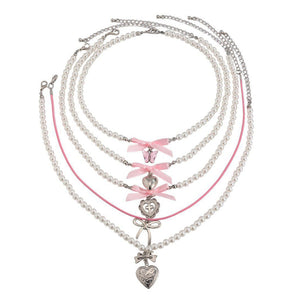 VILZSTUDIOS Layered pearl necklace set with charms and bows
