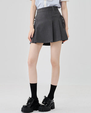VILZSTUDIOS Chic pleated mini skirt with bows