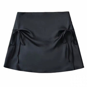 VILZSTUDIOS Chic satin mini skirt with bows by VILZSTUDIOS