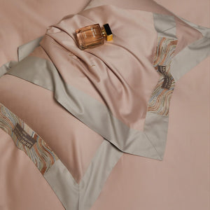 VILZSTUDIOS two-tone satin bedding set with broad contrasting borders and script embroidery