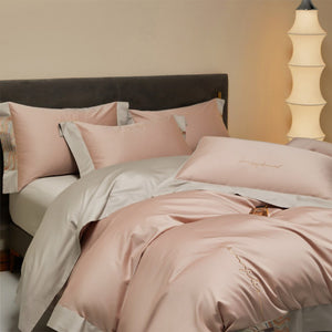 VILZSTUDIOS two-tone satin bedding set with broad contrasting borders and script embroidery