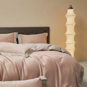 VILZSTUDIOS two-tone satin bedding set with broad contrasting borders and script embroidery
