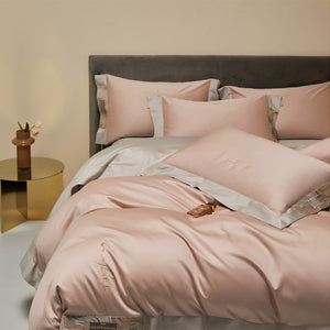 VILZSTUDIOS two-tone satin bedding set with broad contrasting borders and script embroidery
