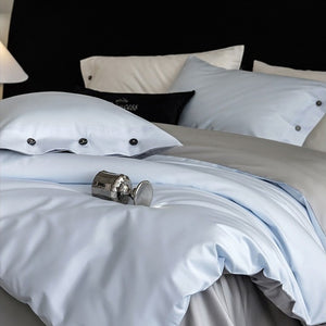 VILZSTUDIOS soft two-tone satin duvet cover set with contrasting dark pillowcase buttons