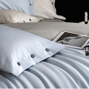 VILZSTUDIOS soft two-tone satin duvet cover set with contrasting dark pillowcase buttons