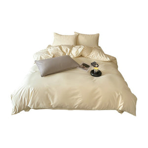 VILZSTUDIOS Neutral and pastel solid-color bedding set with contrast piping on the duvet cover and matching pillowcases