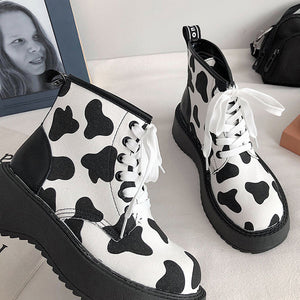 VILZSTUDIOS Cow print ankle boots in stylish design