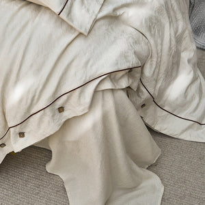 VILZSTUDIOS cream floral damask linen bedding set with dark piping and square buttons