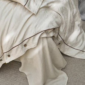 VILZSTUDIOS cream floral damask linen bedding set with dark piping and square buttons