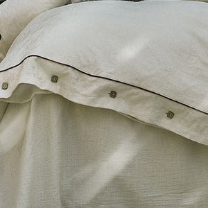 VILZSTUDIOS cream floral damask linen bedding set with dark piping and square buttons
