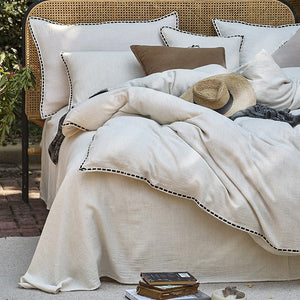 VILZSTUDIOS cream floral damask linen bedding set with dark piping and square buttons