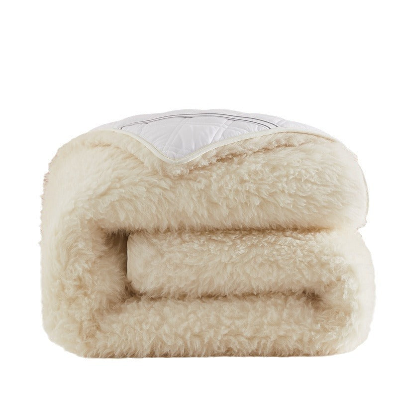 VILZSTUDIOS cream-white wool mattress pad with fluffy pile and diamond-quilted reverse