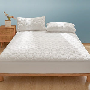 VILZSTUDIOS neutral cotton fitted sheet with diamond quilting and small floral motifs