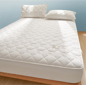 VILZSTUDIOS neutral cotton fitted sheet with diamond quilting and small floral motifs