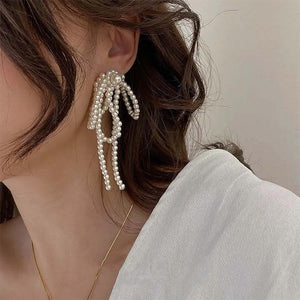 VILZSTUDIOS Elegant earrings with bow and pearl tassels
