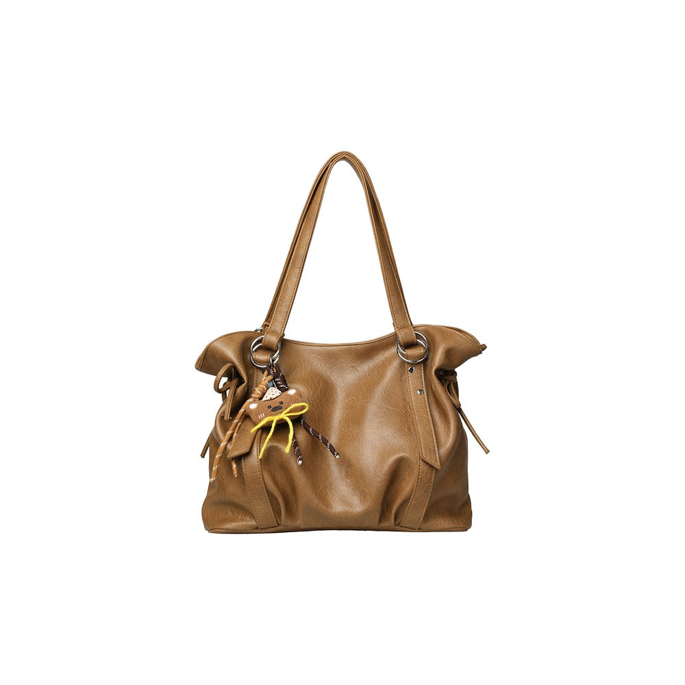 VILZSTUDIOS soft faux leather slouchy tote bag with embroidery charm