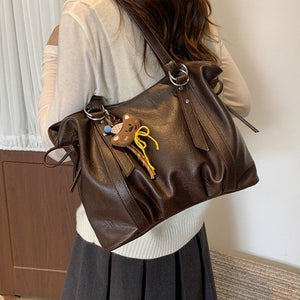 VILZSTUDIOS soft faux leather slouchy tote bag with embroidery charm
