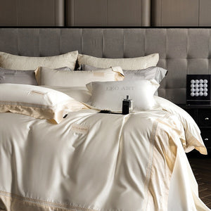 VILZSTUDIOS Blush pink, ivory cream and light gray satin bedding set with eyelet lace borders and embroidered crests