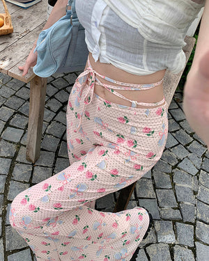 VILZSTUDIOS Flared pants with coquette print and lace-up waist