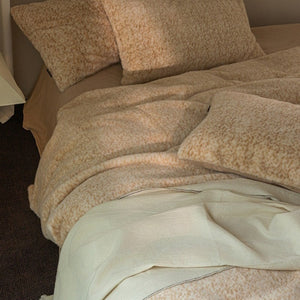 VILZSTUDIOS earthy neutral flecked fleece bedding set with fluffy texture and matching pillowcases