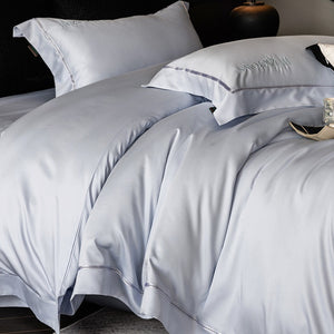 VILZSTUDIOS solid-color satin duvet cover set with wide flanged borders and delicate hemstitch trim