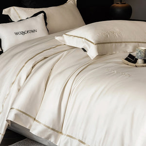 VILZSTUDIOS solid-color satin duvet cover set with wide flanged borders and delicate hemstitch trim