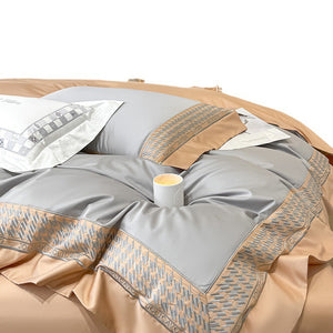 VILZSTUDIOS peach and cream satin duvet cover set with textured houndstooth borders and wide flanged edges