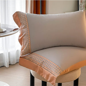 VILZSTUDIOS peach and cream satin duvet cover set with textured houndstooth borders and wide flanged edges