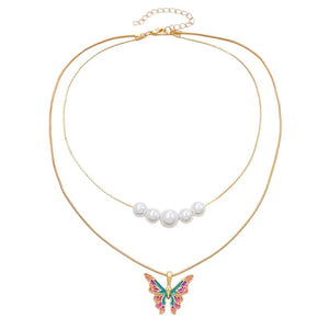 VILZSTUDIOS Layered necklace featuring butterfly charm and pearl accents