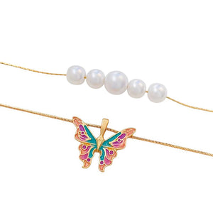 VILZSTUDIOS Layered necklace featuring butterfly charm and pearl accents