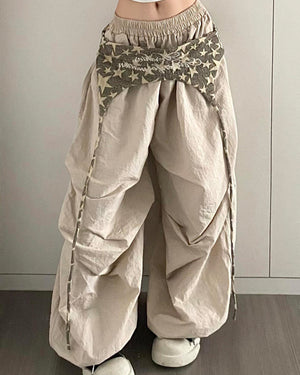 VILZSTUDIOS Layered star-patterned baggy pants from VILZSTUDIOS
