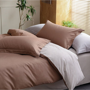 VILZSTUDIOS muted two-tone duvet cover set with contrasting reverse and flanged pillowcases