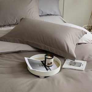 VILZSTUDIOS muted two-tone duvet cover set with contrasting reverse and flanged pillowcases